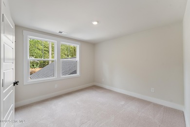 Welcome to your ideal golf and coastal retreat! This beautiful 2 on Brunswick Plantation and Golf Resorts in North Carolina - for sale on GolfHomes.com, golf home, golf lot