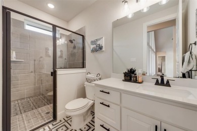 Welcome to this stunning custom-built single-story home on The Golf Club at Resort Eagle Mountain Lake in Texas - for sale on GolfHomes.com, golf home, golf lot