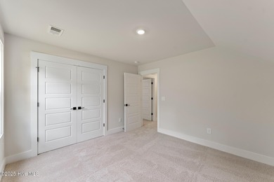 Welcome to your ideal golf and coastal retreat! This beautiful 2 on Brunswick Plantation and Golf Resorts in North Carolina - for sale on GolfHomes.com, golf home, golf lot