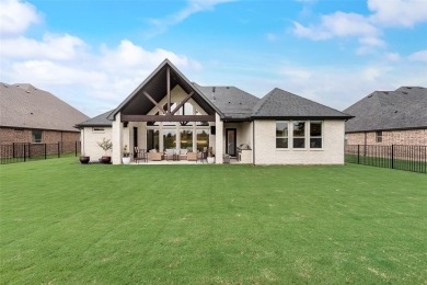 Welcome to this stunning custom-built single-story home on The Golf Club at Resort Eagle Mountain Lake in Texas - for sale on GolfHomes.com, golf home, golf lot
