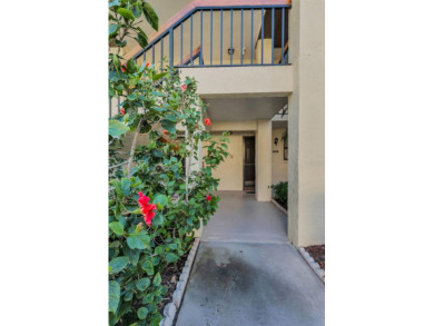 This Happy Home has been freshly updated to brand new!  Located on Countryside Country Club in Florida - for sale on GolfHomes.com, golf home, golf lot