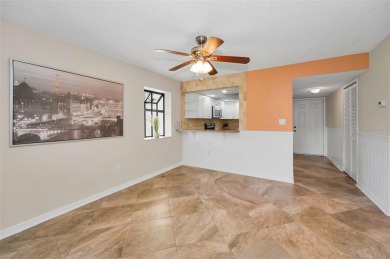 This Happy Home has been freshly updated to brand new!  Located on Countryside Country Club in Florida - for sale on GolfHomes.com, golf home, golf lot