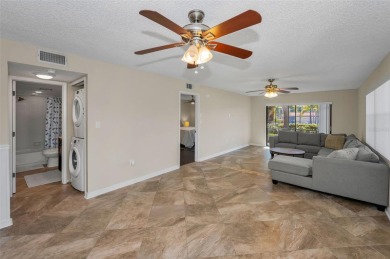 This Happy Home has been freshly updated to brand new!  Located on Countryside Country Club in Florida - for sale on GolfHomes.com, golf home, golf lot