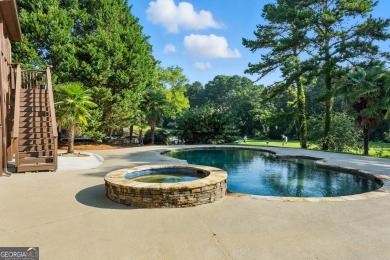 Experience resort-style living in this executive home, perfectly on Hamilton Mill Golf Club in Georgia - for sale on GolfHomes.com, golf home, golf lot