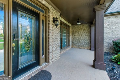 Experience resort-style living in this executive home, perfectly on Hamilton Mill Golf Club in Georgia - for sale on GolfHomes.com, golf home, golf lot
