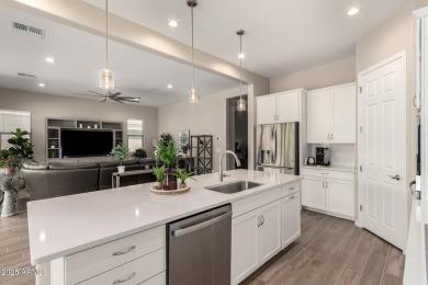 This home offers a fully landscaped backyard, upgrades on Verrado Golf Club  in Arizona - for sale on GolfHomes.com, golf home, golf lot