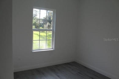 One or more photo(s) has been virtually staged. Beautiful on Marion Oaks Country Club in Florida - for sale on GolfHomes.com, golf home, golf lot