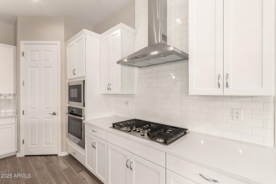 This home offers a fully landscaped backyard, upgrades on Verrado Golf Club  in Arizona - for sale on GolfHomes.com, golf home, golf lot