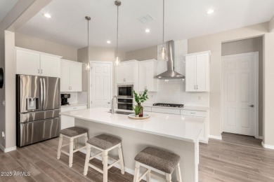This home offers a fully landscaped backyard, upgrades on Verrado Golf Club  in Arizona - for sale on GolfHomes.com, golf home, golf lot