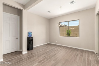 This home offers a fully landscaped backyard, upgrades on Verrado Golf Club  in Arizona - for sale on GolfHomes.com, golf home, golf lot
