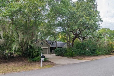 Welcome to your dream home, 142 Rybolt Road, Pawleys Island, SC on Pawleys Plantation Golf and Country Club in South Carolina - for sale on GolfHomes.com, golf home, golf lot