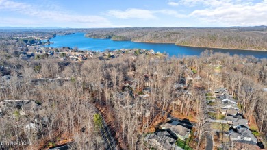 Nestled in the prestigious community of Tellico Village on a on Toqua Golf Course - Loudon County in Tennessee - for sale on GolfHomes.com, golf home, golf lot