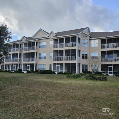EXQUISITE TOP FLOOR LUXURY GATED CONDO IN THE HEART OF GULF on Craft Farms - Cypress Bend in Alabama - for sale on GolfHomes.com, golf home, golf lot