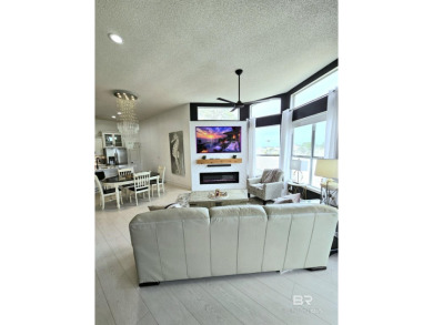 EXQUISITE TOP FLOOR LUXURY GATED CONDO IN THE HEART OF GULF on Craft Farms - Cypress Bend in Alabama - for sale on GolfHomes.com, golf home, golf lot