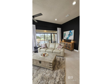 EXQUISITE TOP FLOOR LUXURY GATED CONDO IN THE HEART OF GULF on Craft Farms - Cypress Bend in Alabama - for sale on GolfHomes.com, golf home, golf lot