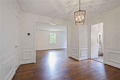 Don't miss this delightful white brick home in the heart of one on Bobby Jones Golf Club in Georgia - for sale on GolfHomes.com, golf home, golf lot