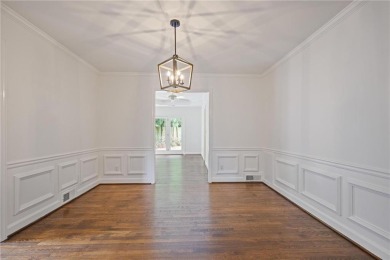 Don't miss this delightful white brick home in the heart of one on Bobby Jones Golf Club in Georgia - for sale on GolfHomes.com, golf home, golf lot