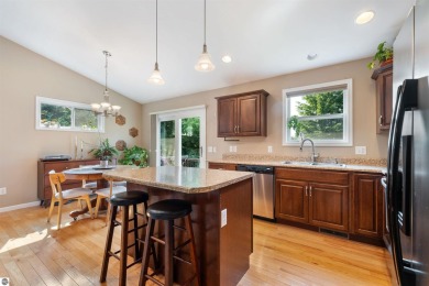 Welcome to this spacious 3-bedroom, 2-bath walkout home on on Bay Meadows Golf Course - Executive in Michigan - for sale on GolfHomes.com, golf home, golf lot
