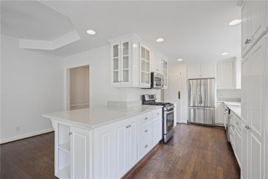 Don't miss this delightful white brick home in the heart of one on Bobby Jones Golf Club in Georgia - for sale on GolfHomes.com, golf home, golf lot