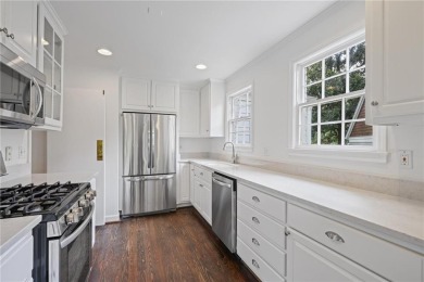 Don't miss this delightful white brick home in the heart of one on Bobby Jones Golf Club in Georgia - for sale on GolfHomes.com, golf home, golf lot
