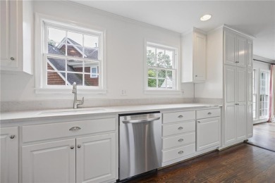 Don't miss this delightful white brick home in the heart of one on Bobby Jones Golf Club in Georgia - for sale on GolfHomes.com, golf home, golf lot