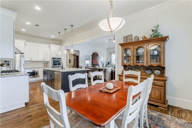 Nestled on a professionally landscaped lot overlooking Bent Pine on The Georgia Club in Georgia - for sale on GolfHomes.com, golf home, golf lot