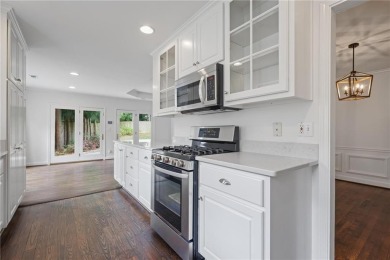 Don't miss this delightful white brick home in the heart of one on Bobby Jones Golf Club in Georgia - for sale on GolfHomes.com, golf home, golf lot