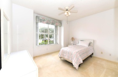 Step into this ground-level condo, where a warm embrace awaits on The Golf Club of Jupiter in Florida - for sale on GolfHomes.com, golf home, golf lot
