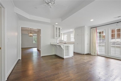 Don't miss this delightful white brick home in the heart of one on Bobby Jones Golf Club in Georgia - for sale on GolfHomes.com, golf home, golf lot