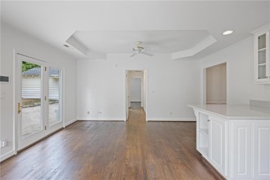 Don't miss this delightful white brick home in the heart of one on Bobby Jones Golf Club in Georgia - for sale on GolfHomes.com, golf home, golf lot