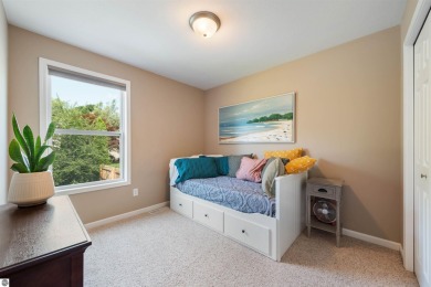 Welcome to this spacious 3-bedroom, 2-bath walkout home on on Bay Meadows Golf Course - Executive in Michigan - for sale on GolfHomes.com, golf home, golf lot
