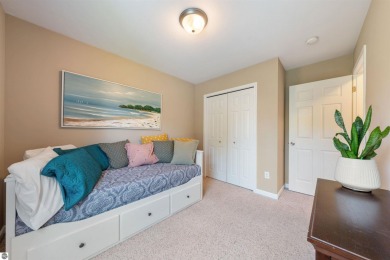 Welcome to this spacious 3-bedroom, 2-bath walkout home on on Bay Meadows Golf Course - Executive in Michigan - for sale on GolfHomes.com, golf home, golf lot