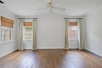 Don't miss this delightful white brick home in the heart of one on Bobby Jones Golf Club in Georgia - for sale on GolfHomes.com, golf home, golf lot