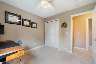 Welcome to this spacious 3-bedroom, 2-bath walkout home on on Bay Meadows Golf Course - Executive in Michigan - for sale on GolfHomes.com, golf home, golf lot