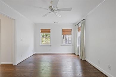 Don't miss this delightful white brick home in the heart of one on Bobby Jones Golf Club in Georgia - for sale on GolfHomes.com, golf home, golf lot
