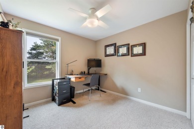 Welcome to this spacious 3-bedroom, 2-bath walkout home on on Bay Meadows Golf Course - Executive in Michigan - for sale on GolfHomes.com, golf home, golf lot
