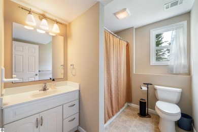 Welcome to this spacious 3-bedroom, 2-bath walkout home on on Bay Meadows Golf Course - Executive in Michigan - for sale on GolfHomes.com, golf home, golf lot