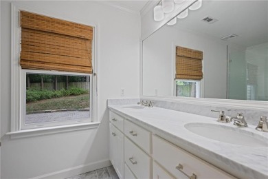 Don't miss this delightful white brick home in the heart of one on Bobby Jones Golf Club in Georgia - for sale on GolfHomes.com, golf home, golf lot