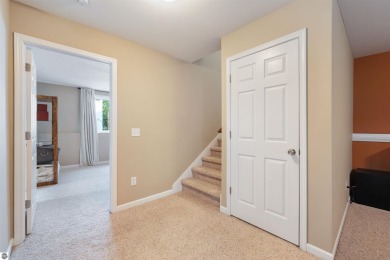 Welcome to this spacious 3-bedroom, 2-bath walkout home on on Bay Meadows Golf Course - Executive in Michigan - for sale on GolfHomes.com, golf home, golf lot