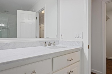 Don't miss this delightful white brick home in the heart of one on Bobby Jones Golf Club in Georgia - for sale on GolfHomes.com, golf home, golf lot