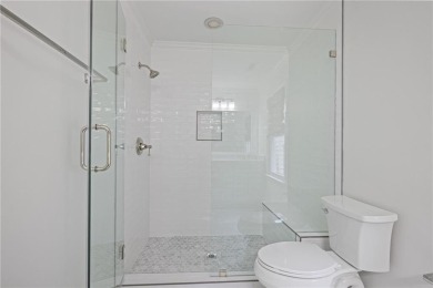 Don't miss this delightful white brick home in the heart of one on Bobby Jones Golf Club in Georgia - for sale on GolfHomes.com, golf home, golf lot