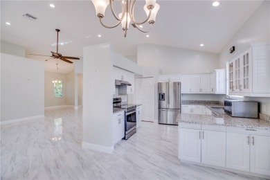 Beautifully upgraded home with pond view in PGA Village. June on The Legacy Golf and Tennis Club in Florida - for sale on GolfHomes.com, golf home, golf lot