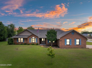 This spacious and beautifully updated 4-bedroom, 2.5-bath brick on Panama Country Club in Florida - for sale on GolfHomes.com, golf home, golf lot