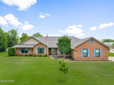 This spacious and beautifully updated 4-bedroom, 2.5-bath brick on Panama Country Club in Florida - for sale on GolfHomes.com, golf home, golf lot