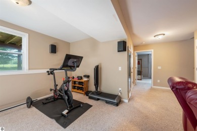 Welcome to this spacious 3-bedroom, 2-bath walkout home on on Bay Meadows Golf Course - Executive in Michigan - for sale on GolfHomes.com, golf home, golf lot