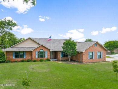 This spacious and beautifully updated 4-bedroom, 2.5-bath brick on Panama Country Club in Florida - for sale on GolfHomes.com, golf home, golf lot