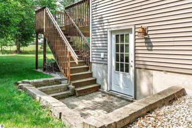 Welcome to this spacious 3-bedroom, 2-bath walkout home on on Bay Meadows Golf Course - Executive in Michigan - for sale on GolfHomes.com, golf home, golf lot
