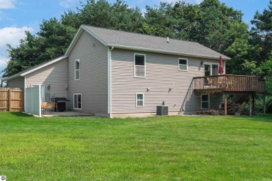 Welcome to this spacious 3-bedroom, 2-bath walkout home on on Bay Meadows Golf Course - Executive in Michigan - for sale on GolfHomes.com, golf home, golf lot