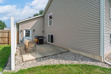 Welcome to this spacious 3-bedroom, 2-bath walkout home on on Bay Meadows Golf Course - Executive in Michigan - for sale on GolfHomes.com, golf home, golf lot