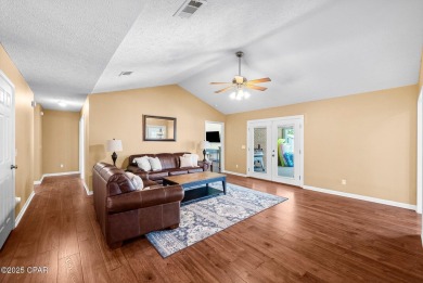This spacious and beautifully updated 4-bedroom, 2.5-bath brick on Panama Country Club in Florida - for sale on GolfHomes.com, golf home, golf lot
